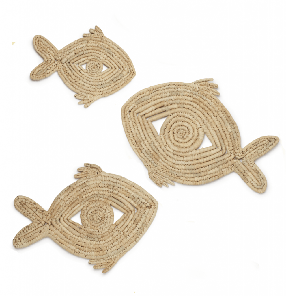 Three palm leaf fish-shaped placemats