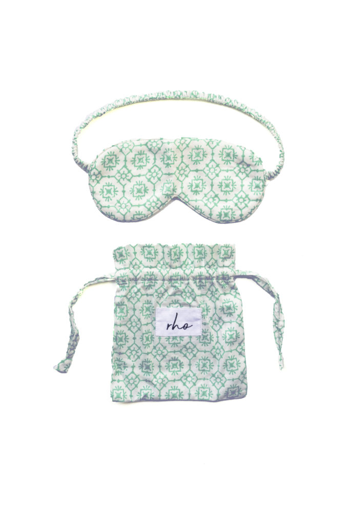 The Valerie eye mask and the bag it comes in on a white background