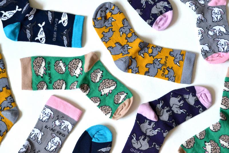 A collection of Bare Kind Save the Animals socks for kids