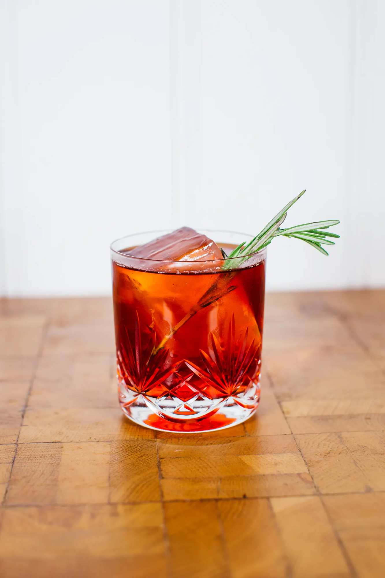 A negroni in a classic cocktail glass