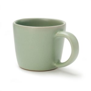 A green espresso cup