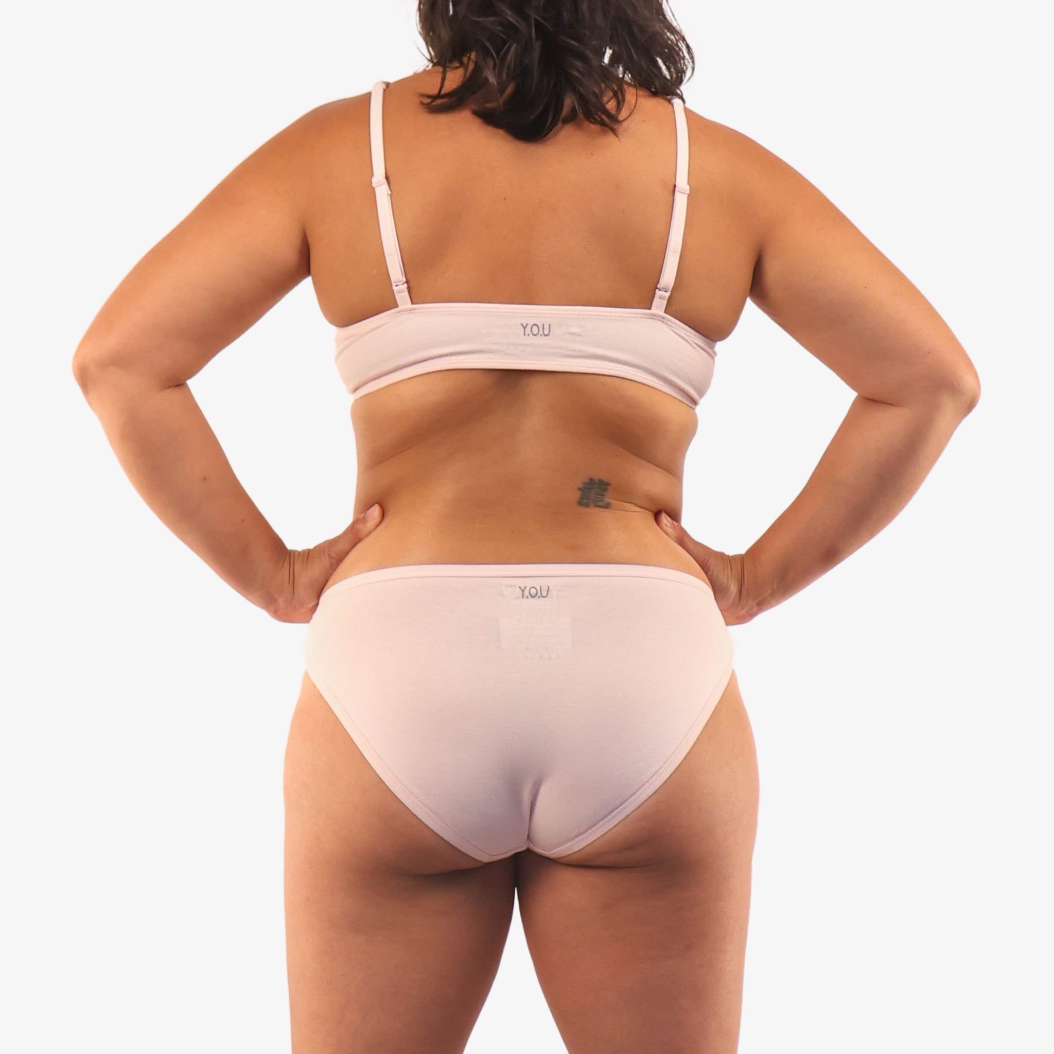 Women's organic cotton matching bralette and bikini set in light pink